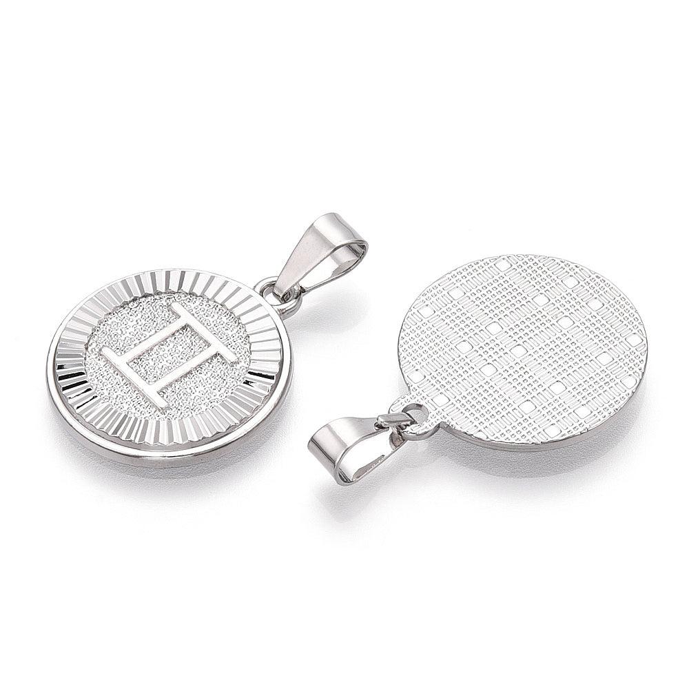 Bedel sterrenbeeld 'tweeling' 24x20.5x2mm RVS zilver