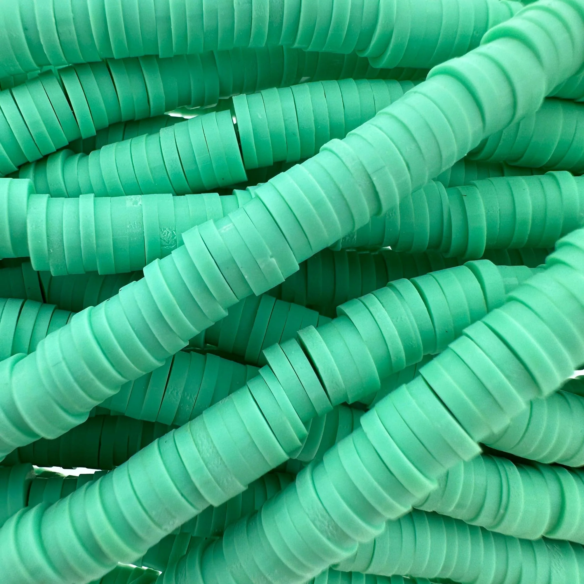 Disc kralen polymeer 6x1mm Mint groen - ±400 stuks