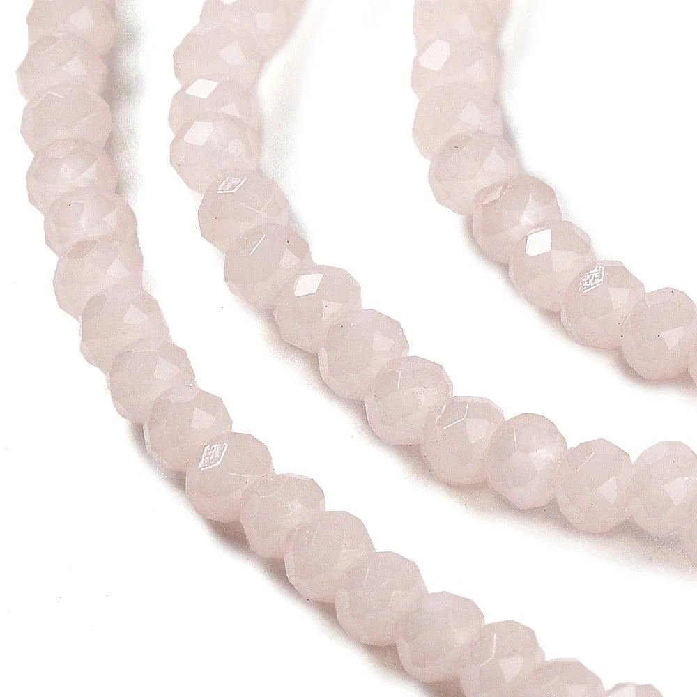 Facet rondelle 3x2mm misty rose- per ±158 stuks