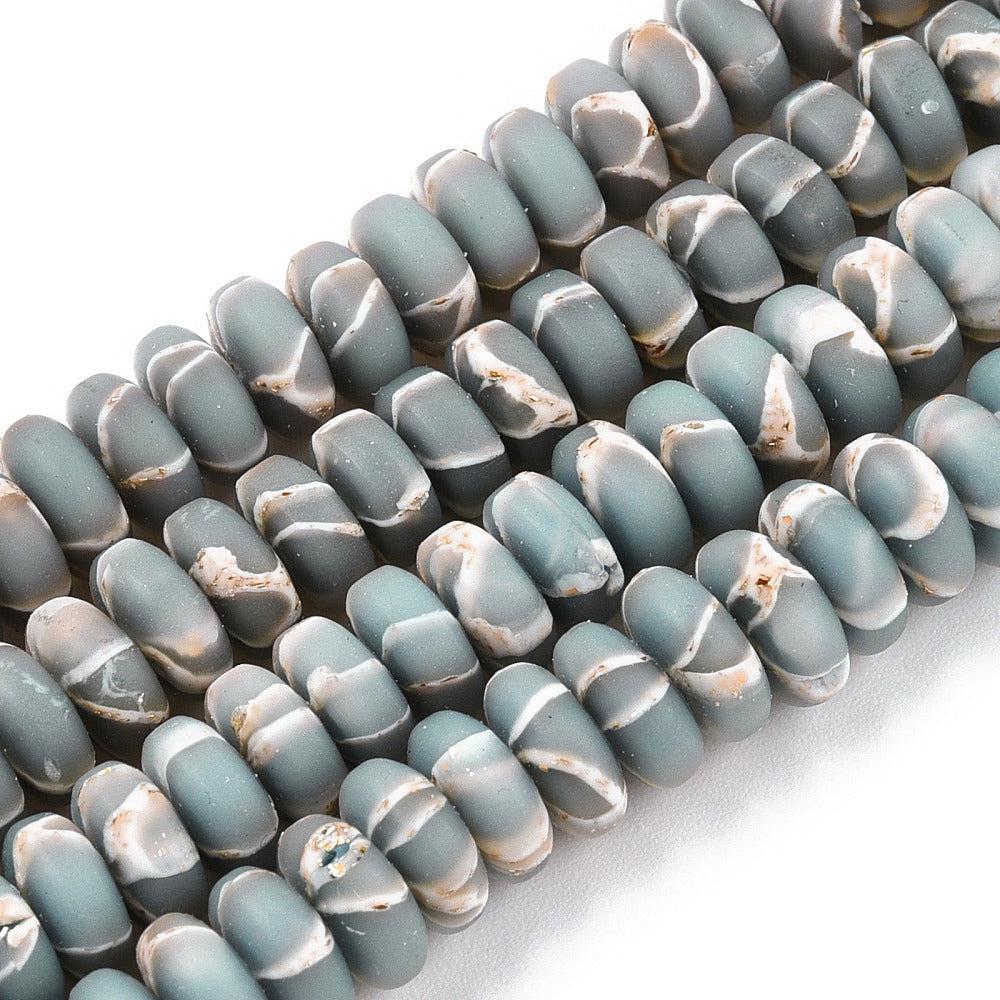 Fimo kralen grey gold foil 6x3mm- 20 stuks