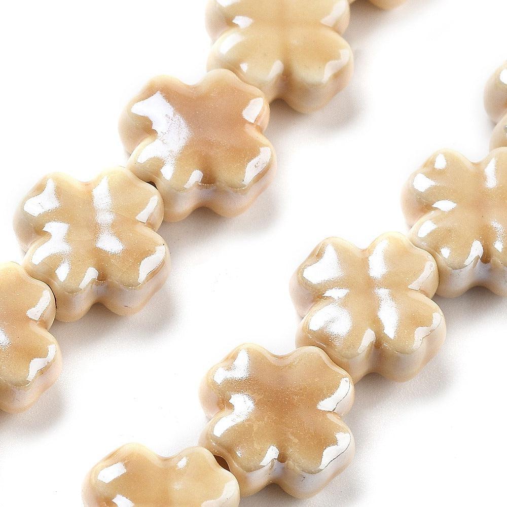 Keramiek kraal Klaver Beige 12mm- per stuk