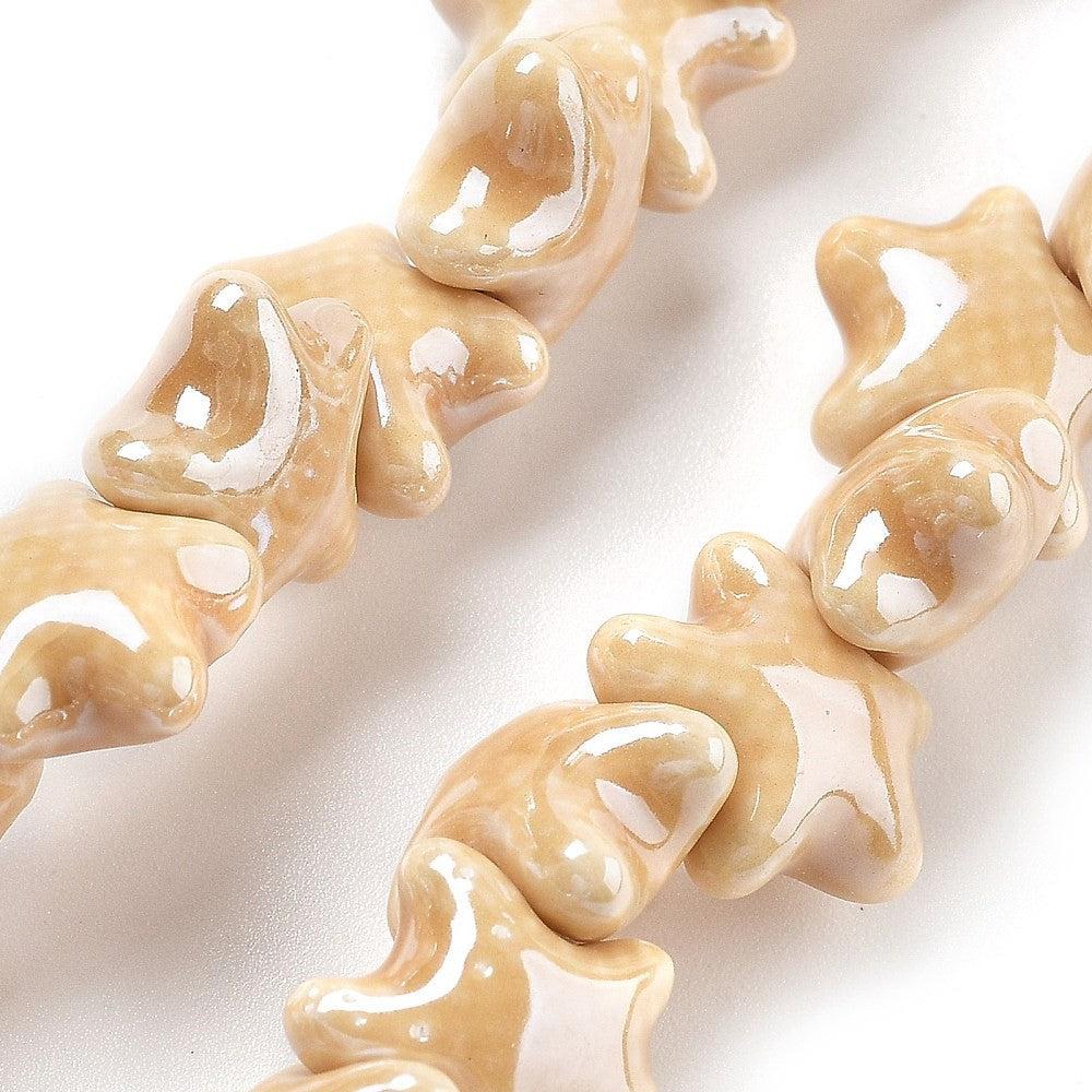 Keramiek kraal Zeester Beige 12mm- per stuk