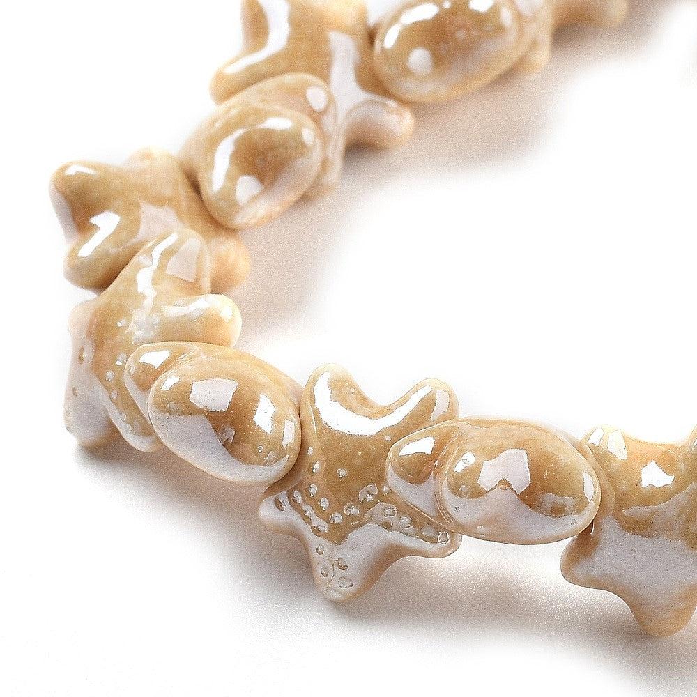 Keramiek kraal Zeester Beige 12mm- per stuk - Image 2