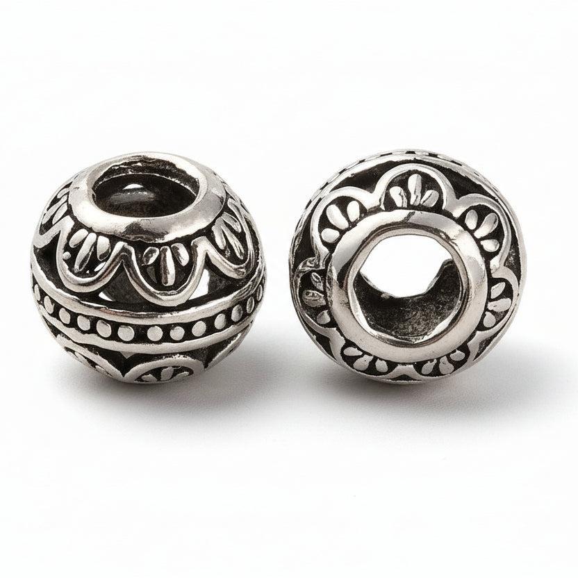 Kraal rondel bloem motief Zilver 11x9mm - per stuk