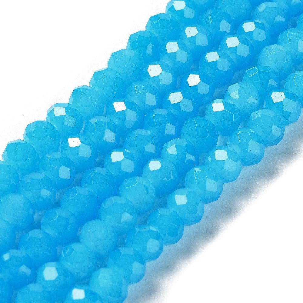 Kralen imitatie jade facet ocean blue 6x5mm- per 85 stuks