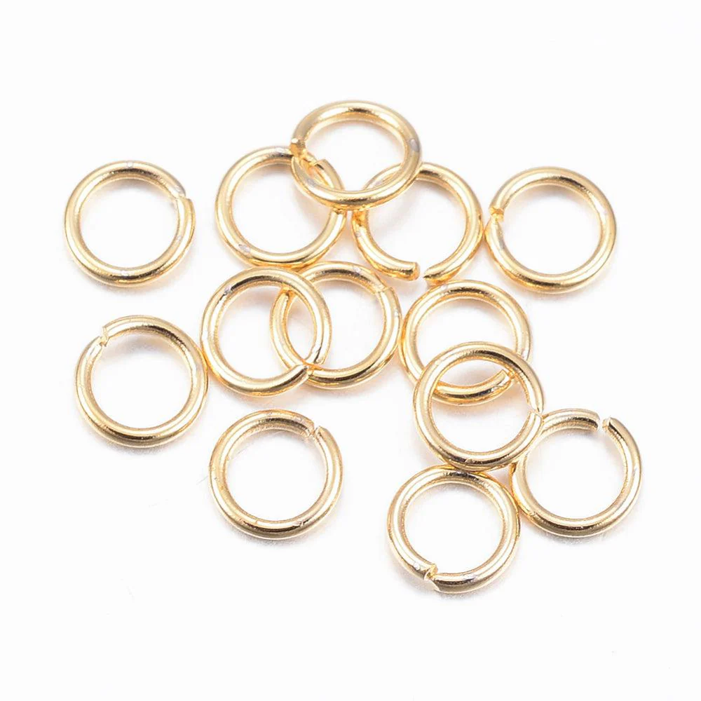 Ringetjes Stainless steel 24kr goud 6x1,2mm - 12 stuks