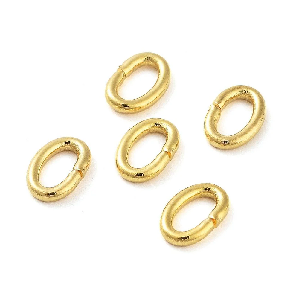 Ringetjes 4x6x1mm 24K goud DQ - per 20 stuks