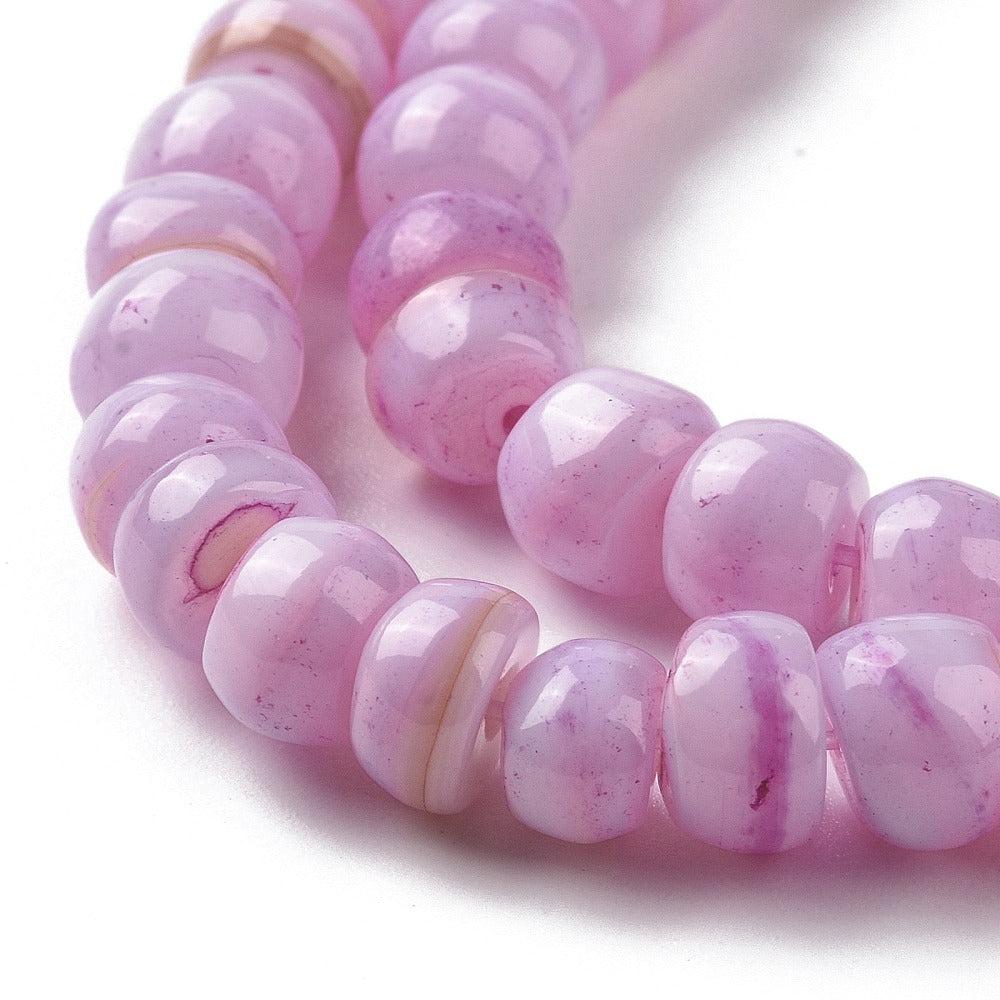 Zoetwaterschelp disc roze ±7x4mm- per 9cm