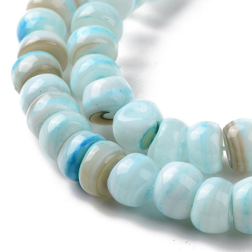 Zoetwaterschelp disc sky blue ±7x4mm - ± 9cm